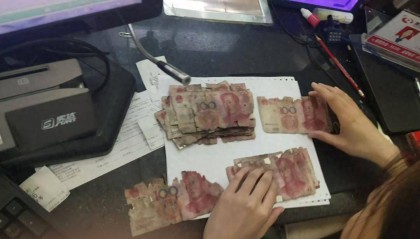 家中漏水致人民币碳化!舞钢农商银行暖心服务解难题